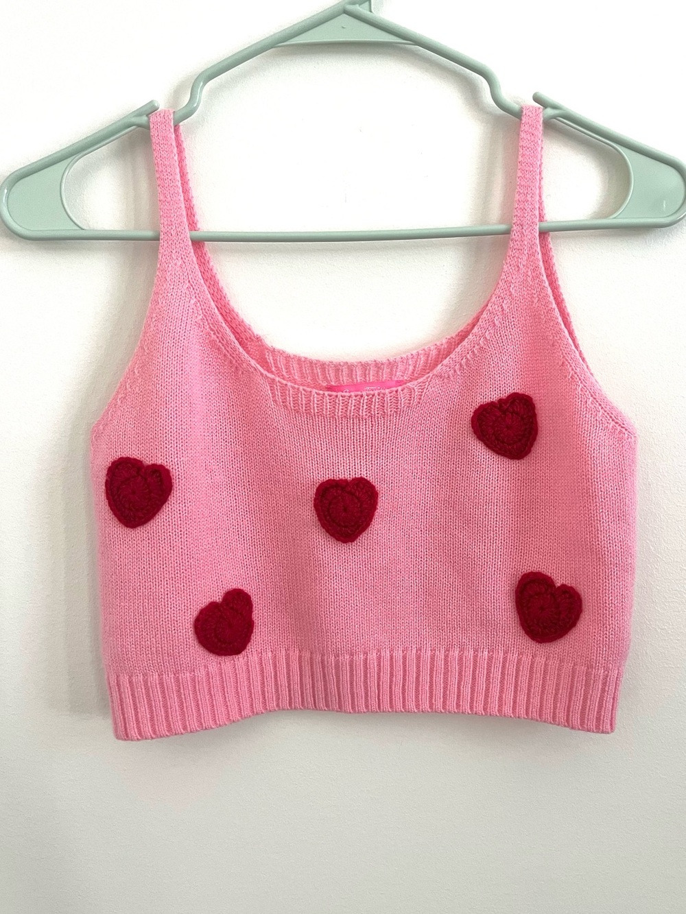Sugar Thrillz by Dolls Kill pink cropped sweater tank with crochet hearts